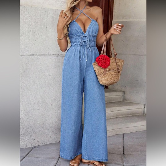 Dusty blue surplice neck belted jumpsuit